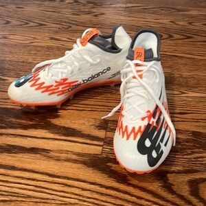 New New Balance BurnX3 Lacrosse Cleats.  Orange and white.  Size 6.5M/8 Women